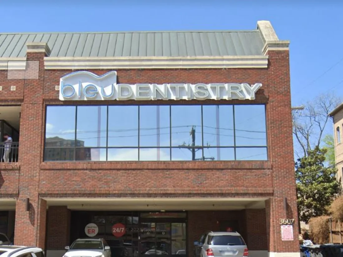 The Bleu Dentistry building on Oak Lawn Avenue, with signage above the second-floor windows.