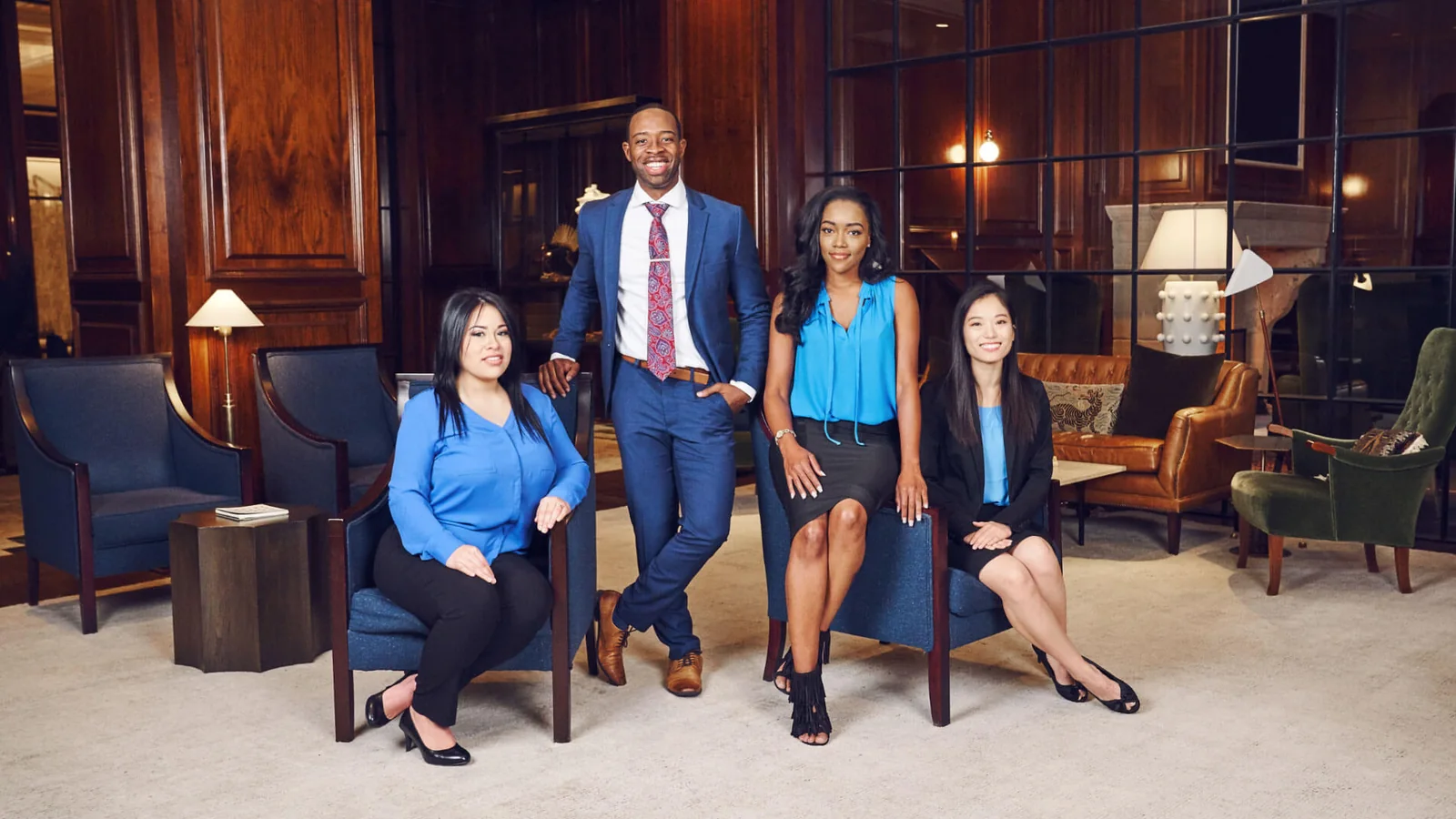 The Bleu Dentistry team of five, photographed in the practice lounge.